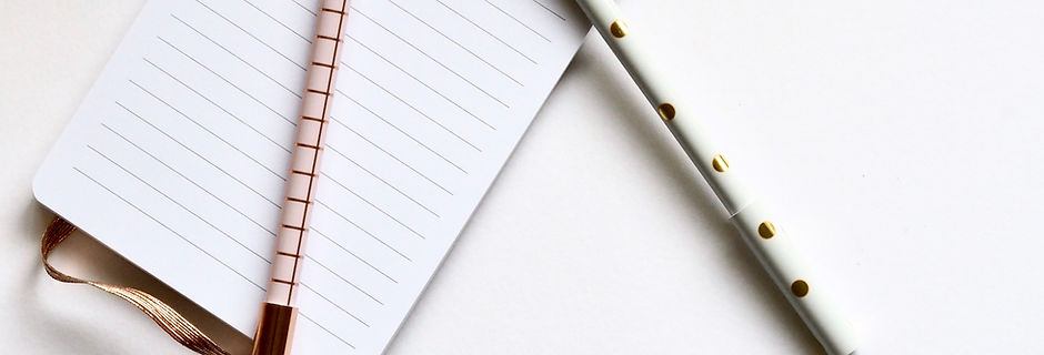 Notitieboek met pennen